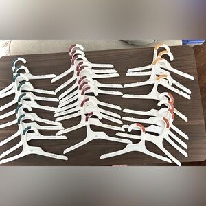 Lot of 27 Target Plastic Baby Shirt Hangers sizes 3mo to 12mo NEW Retail Hangers